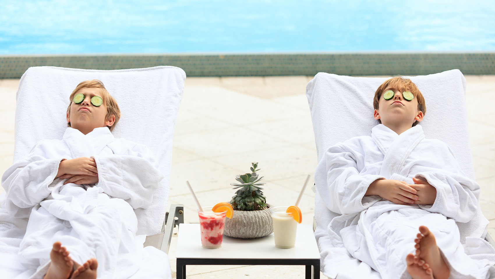 Kids hanging out by the pool