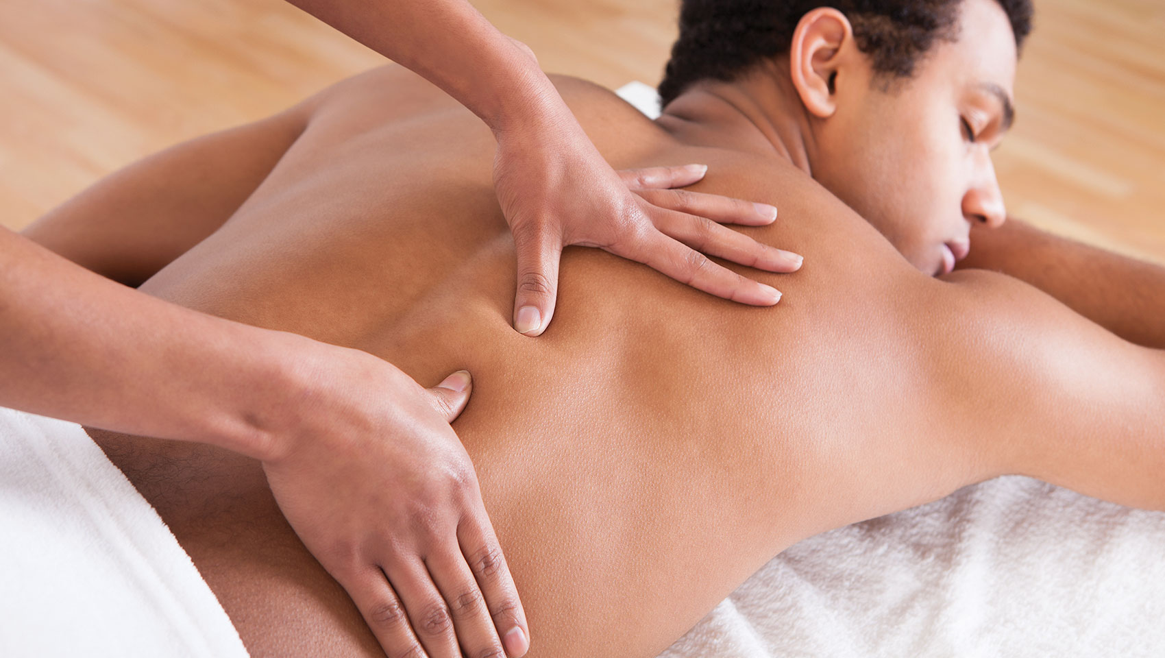 man laying down getting massage