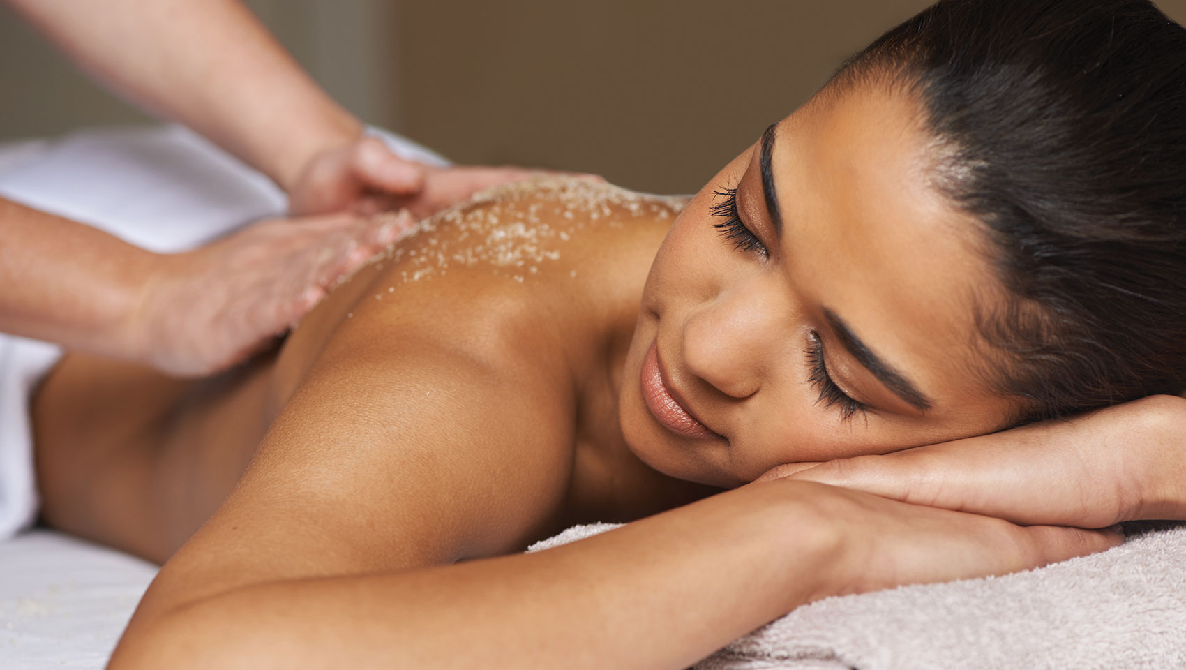 woman laying down getting massage