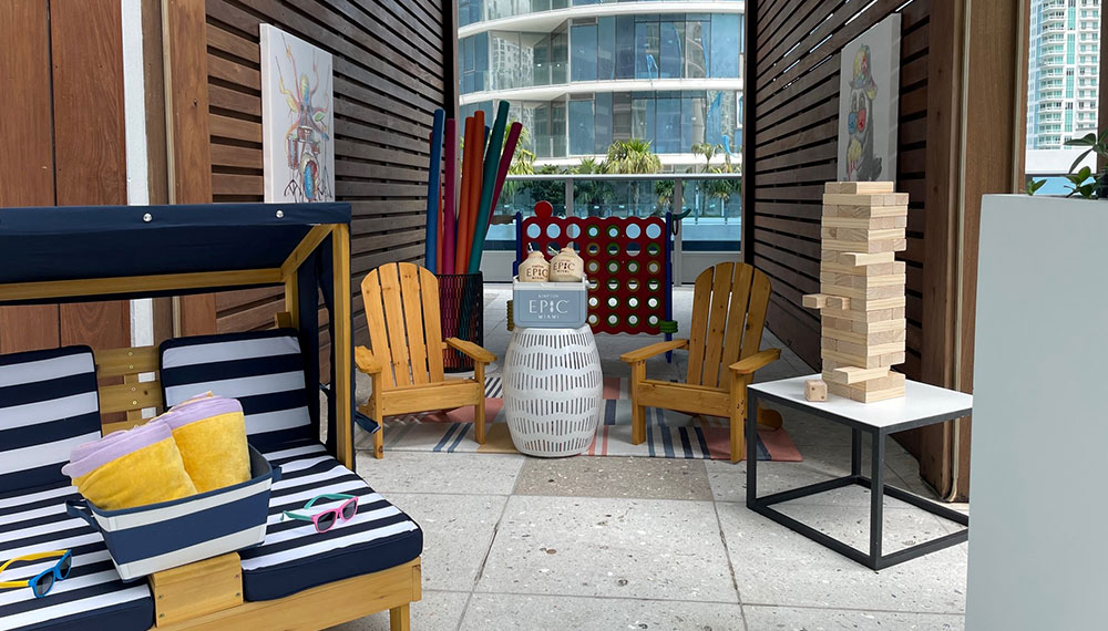 kids cabana at Kimpton epic hotel with pool noodles, jenga, kids sunglasses and more.
