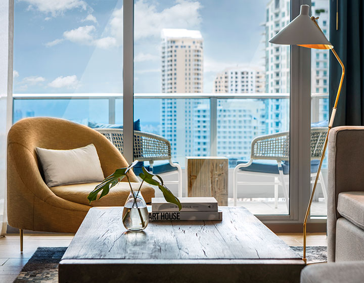 two chairs and a table in a suite