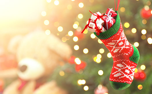 christmas stocking on tree + teddy bear